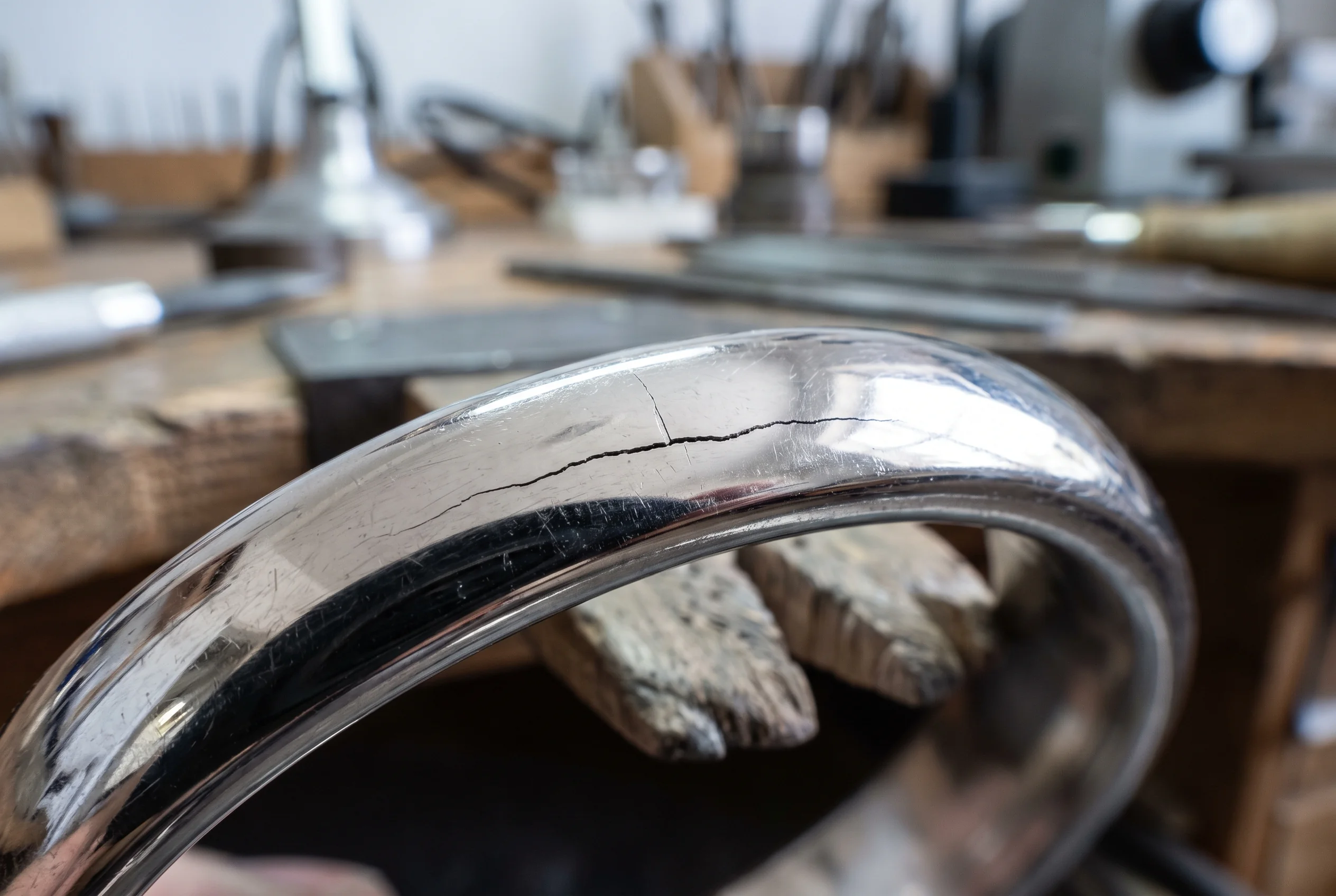 Macro of a hairline crack running across a band